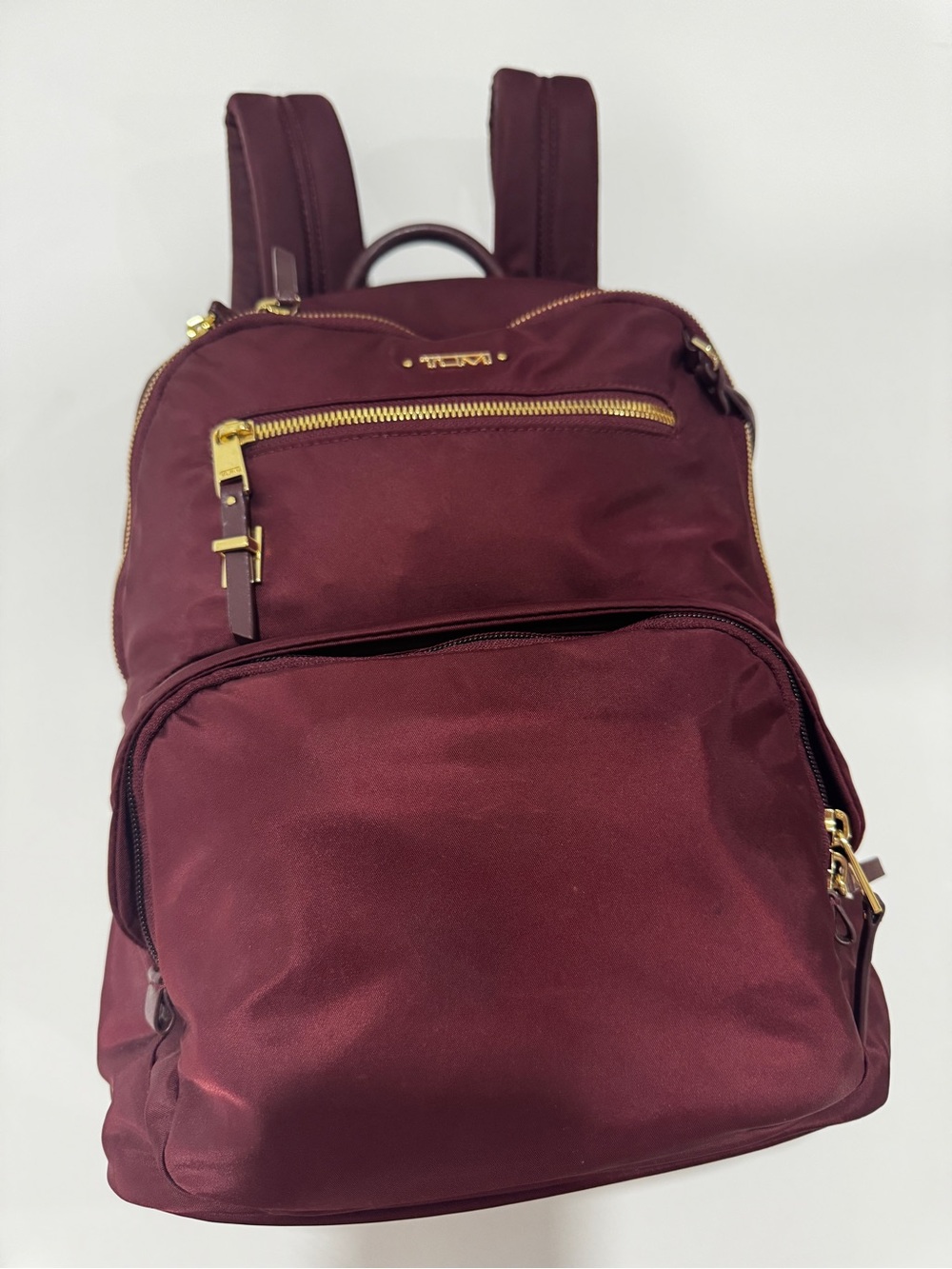 TUMI Unisex Voyageur Hilden Beetroot color Backpack with Gold Hardware